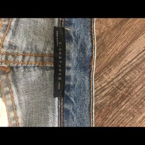 Signature 8 Size Large cut off shorts.